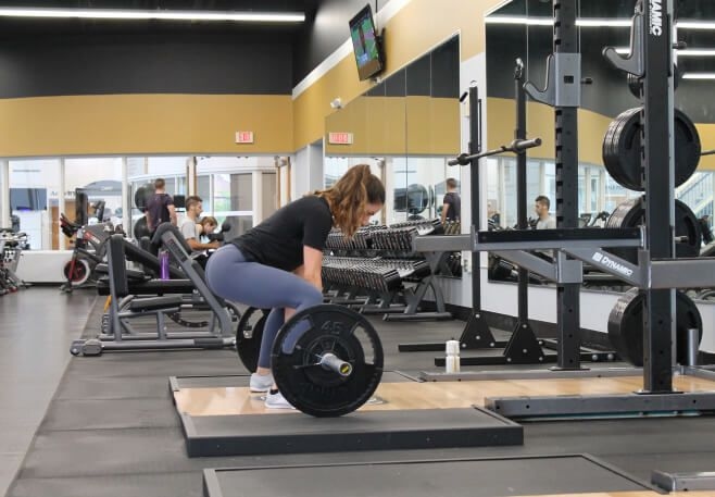 Woman deadlifting