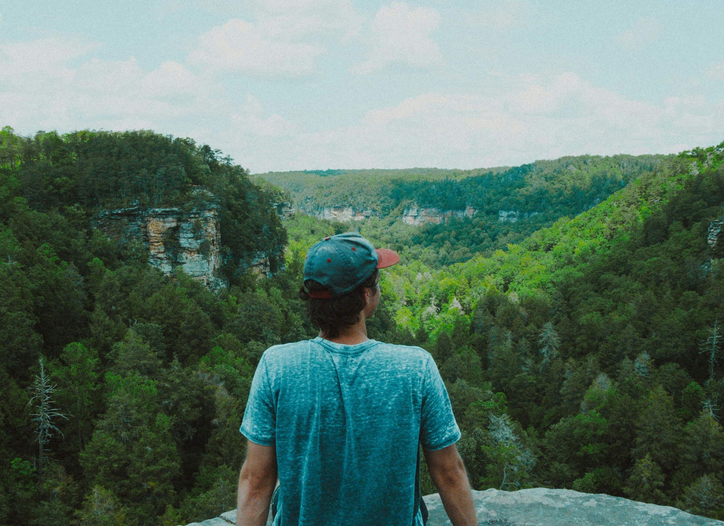 Man looking at mountains